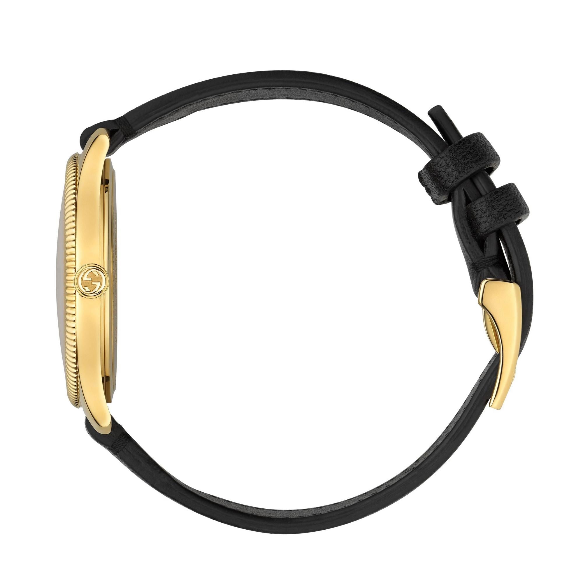 Elegant Gucci G-Timeless Ladies' Gold Tone Black Leather Watch